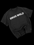 Black t-shirt with 'SNUG WRLD' text on a white background