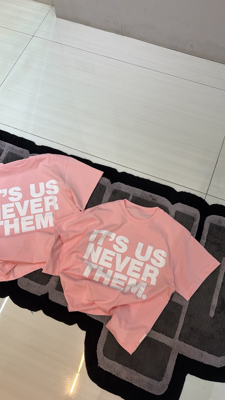 IT'S US NEVER THEM TEE PINK