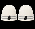 Two white knit hats with black and gray accents on a white background